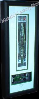 Racing car at bottom, limited edition print on top