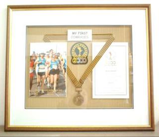 Photo, medal and certificate are floated